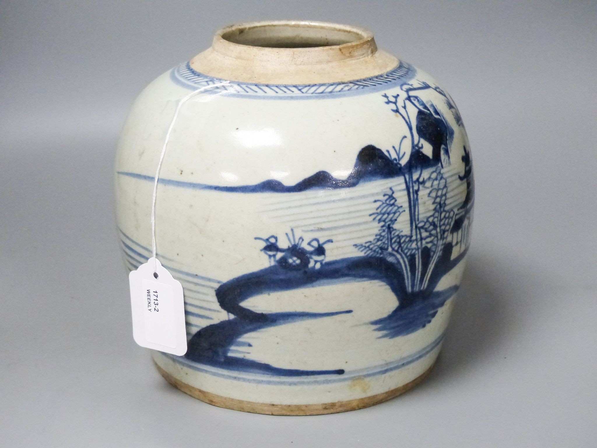 A 19th century Chinese blue and white jar, 20.5 cm high, of squat baluster form, seascape decoration (damage) 20cm